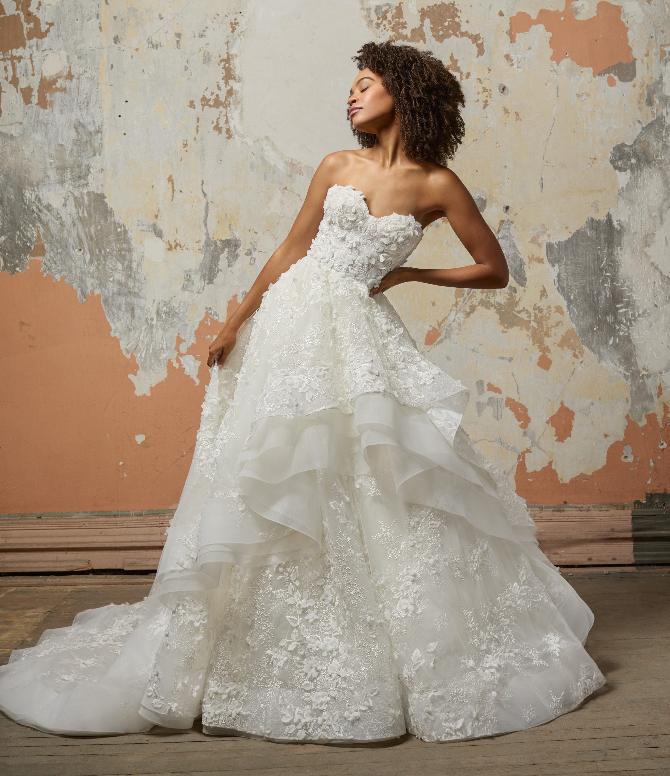 Chic And Romantic Tiered Ball Gown by Lazaro - Image 1