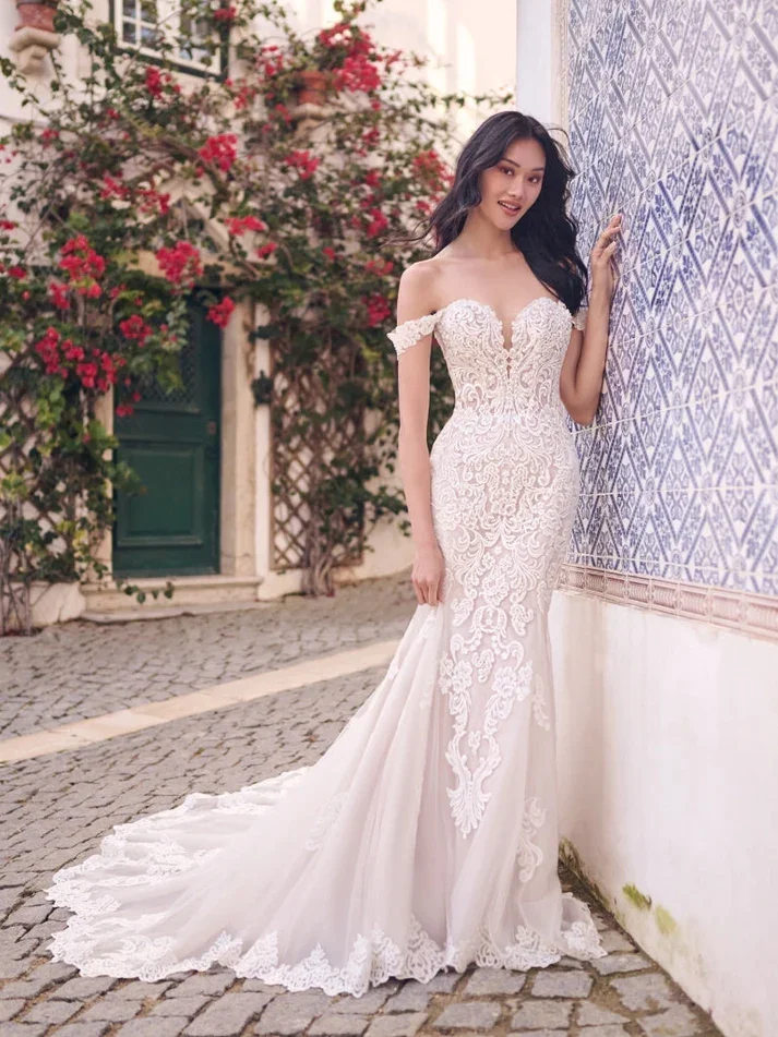 Romantic And Sexy Lace Fit-and-Flare Gown by Maggie Sottero - Image 1