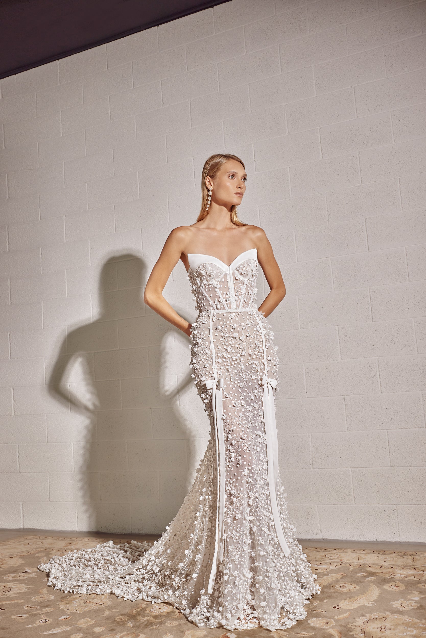 Bow-Adorned Floral Fit-and-Flare Gown With Detachable Overskirt by Tal Kedem Bridal Couture - Image 1