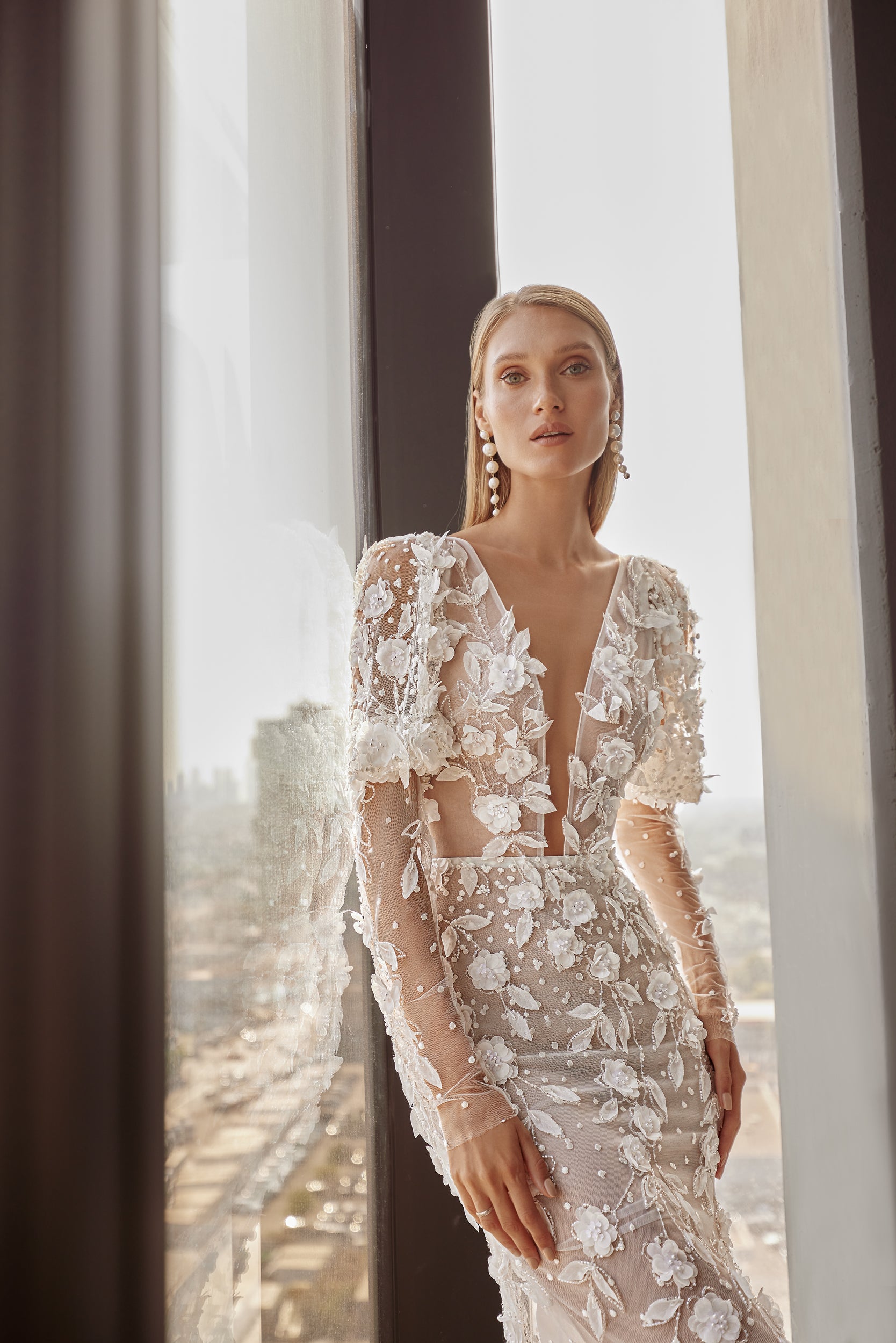 Illusion Long Sleeve Fit-and-Flare Gown With Florals And Pearls by Tal Kedem Bridal Couture - Image 1