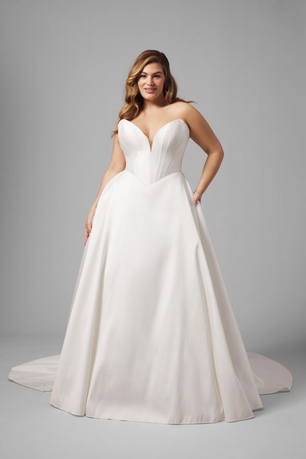 Plus-Size Simple Strapless Basque-Waist Ball Gown by Love by Pnina Tornai - Image 1