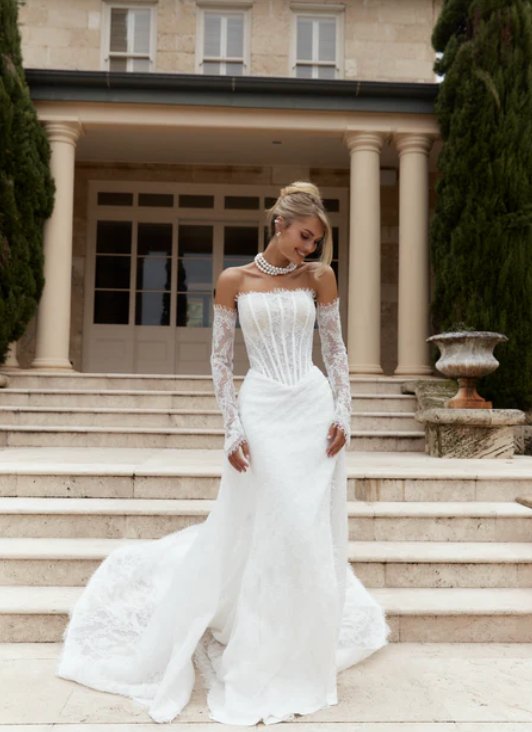 Romantic Lace Fit-And-Flare Wedding Dress With Overskirt by Jane Hill - Image 1