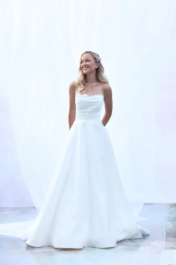 Plus-Size Romantic Satin A-Line Wedding Dress With Lace Details And Buttons by Augusta Jones - Image 1