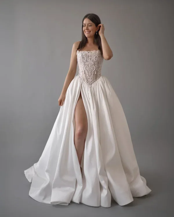 Dramatic And Modern Embellished Ball Gown With Corset And Slit by Blanche Bridal - Image 1