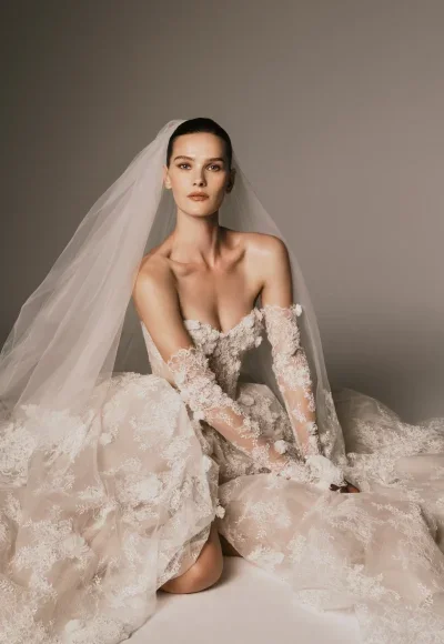 Dramatic And Romantic Lace Ball Gown With Detachable Sleeves by Nicole + Felicia - Image 2