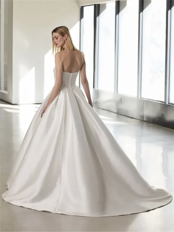 Chic And Sophisticated Silk Ball Gown With Detachable Sleeves And Topper by Pronovias - Image 4