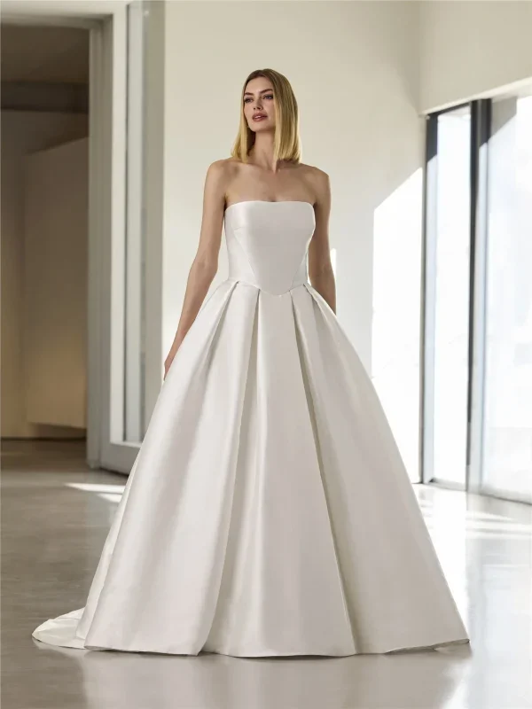 Chic And Sophisticated Silk Ball Gown With Detachable Sleeves And Topper by Pronovias - Image 1