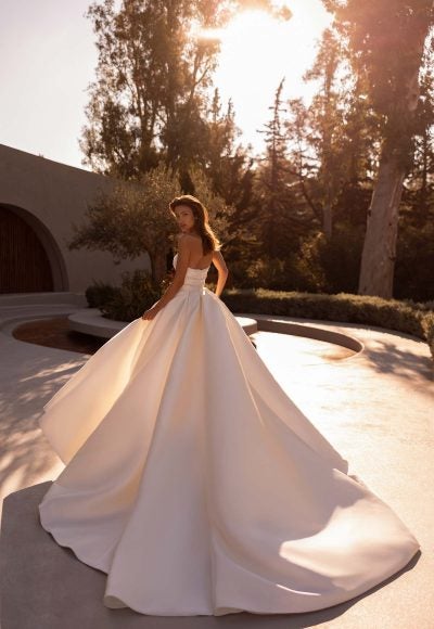 Dramatic Silk Ball Gown With Slit And Detachable Puff Sleeves by Demetrios - Image 2