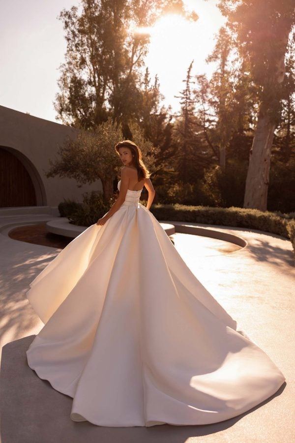 Dramatic Silk Ball Gown With Slit And Detachable Puff Sleeves by Demetrios - Image 2