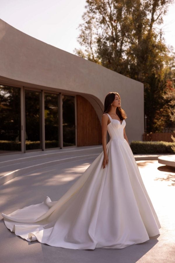 Simple And Dramatic Corset Ball Gown With Straps by Demetrios - Image 1