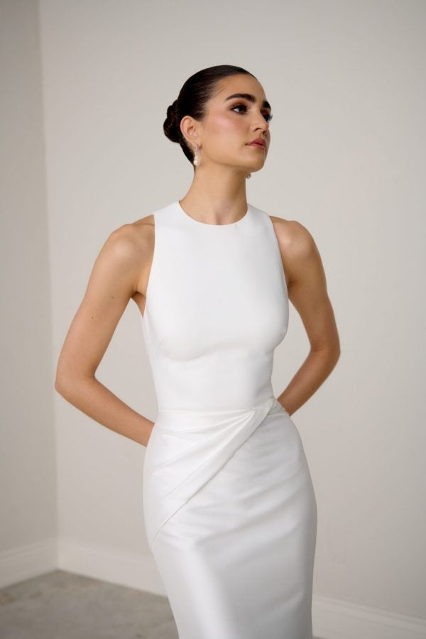 Silk High-Neck Fit-And-Flare Wedding Dress With Open Back And Buttons by Justin Alexander Signature - Image 2