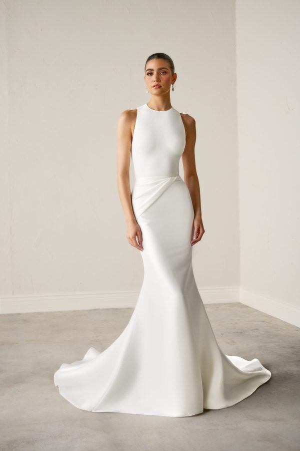 Silk High-Neck Fit-And-Flare Wedding Dress With Open Back And Buttons by Justin Alexander Signature - Image 1