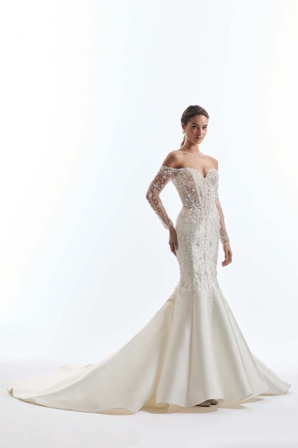Glamorous Fully-Embellished Fit-And-Flare Wedding Dress With Off-The-Shoulder Long Sleeves by Demetrios - Image 1
