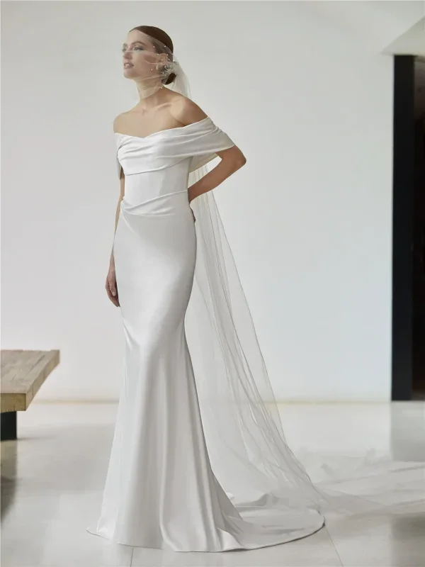 Simple Off-The-Shoulder Silk Sheath Wedding Dress With Buttons by Pronovias - Image 1