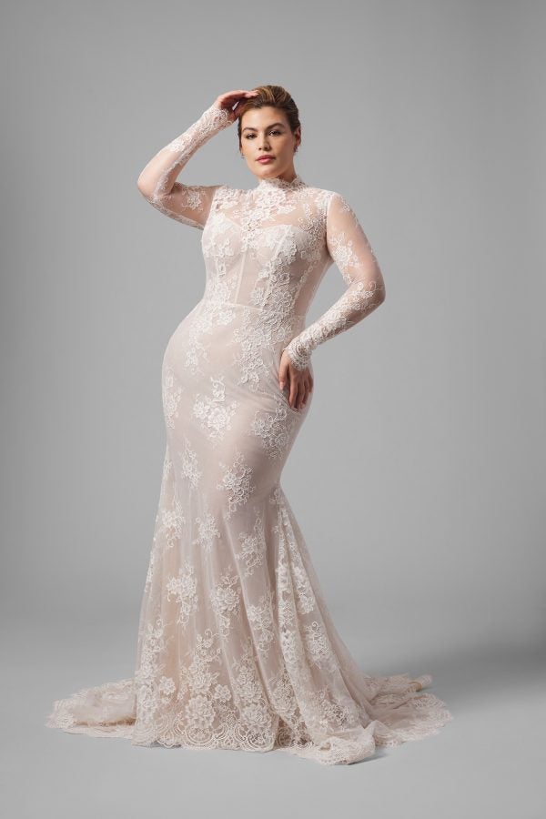 Plus-Size Chic And Romantic Lace High-Neck Long Sleeve Fit-And-Flare Wedding Dress by Arava Polak - Image 1