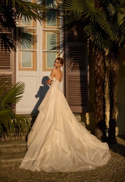 Dramatic And Romantic Sparkly Tiered Ball Gown With 3D Florals by Randy Fenoli - Image 2