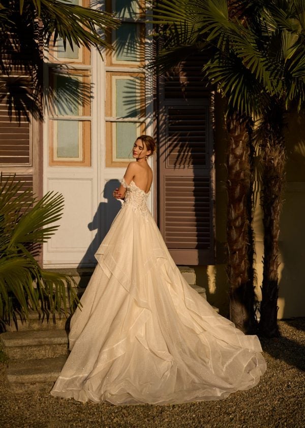 Dramatic And Romantic Sparkly Tiered Ball Gown With 3D Florals by Randy Fenoli - Image 2