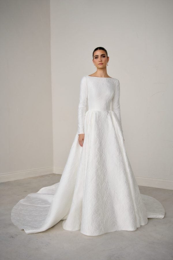 High-Neck Long Sleeve Brocade A-Line Wedding Dress With Open Back And Buttons by Justin Alexander Signature - Image 1
