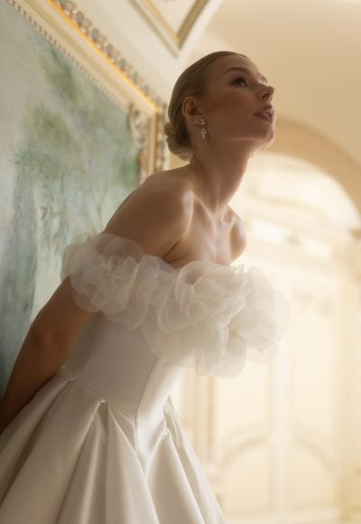 Plus-Size Chic And Classic Strapless Silk Ball Gown With Pockets And Buttons by Verdin Bridal - Image 2