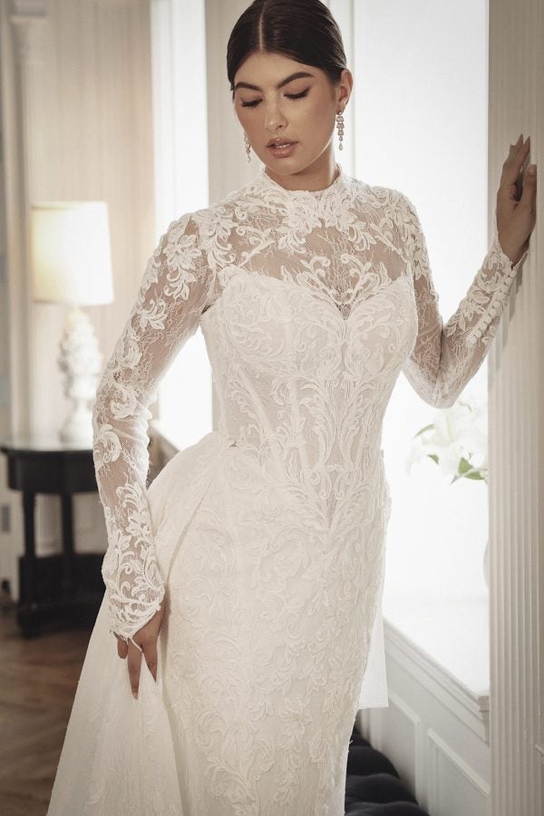 High-Neck Long Sleeve Lace Fit-And-Flare Wedding Dress With Detachable Overskirt by Martina Liana - Image 4
