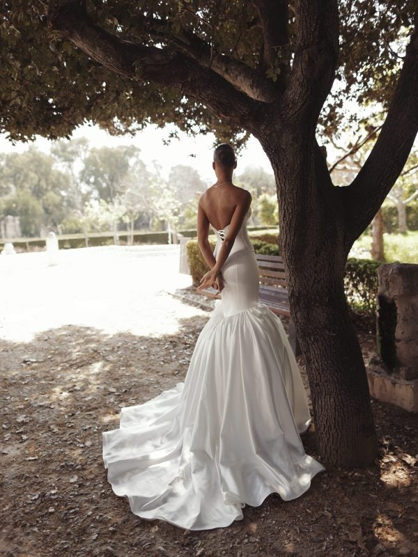 Modern And Minimalist Satin Mermaid Wedding Dress With Bows by Love by Pnina Tornai - Image 2