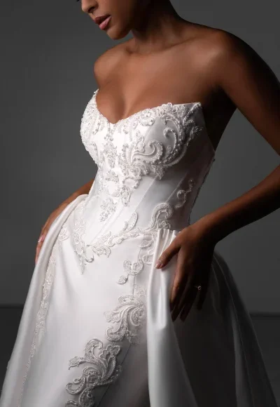 Plus-Size Regal And Dramatic Embellished Lace Silk Fit-And-Flare Wedding Dress With Overskirt by Martina Liana Luxe - Image 3