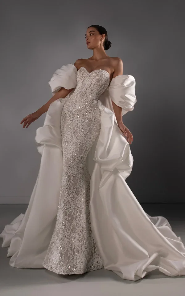 Embellished Lace Sheath Wedding Dress With Detachable Shawl And Overskirt by Martina Liana Luxe - Image 1