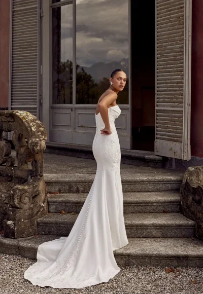 Sophisticated Fit-and-Flare Wedding Dress With Lace Appliqués by Justin Alexander - Image 3