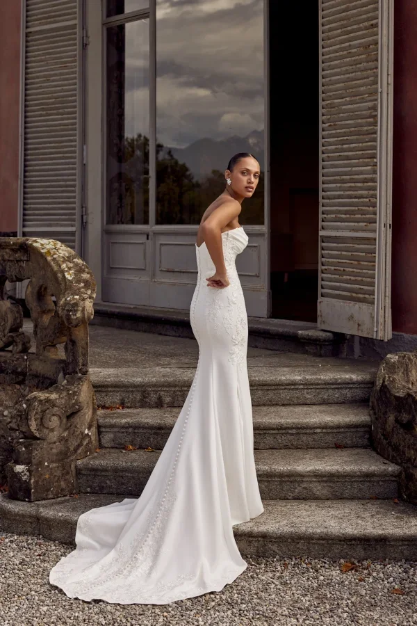 Sophisticated Fit-and-Flare Wedding Dress With Lace Appliqués by Justin Alexander - Image 3