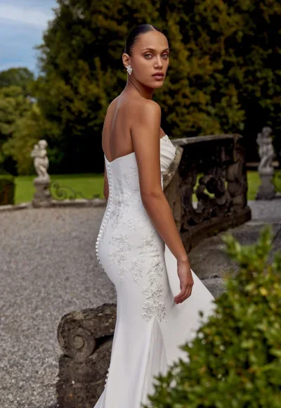 Sophisticated Fit-and-Flare Wedding Dress With Lace Appliqués by Justin Alexander - Image 2