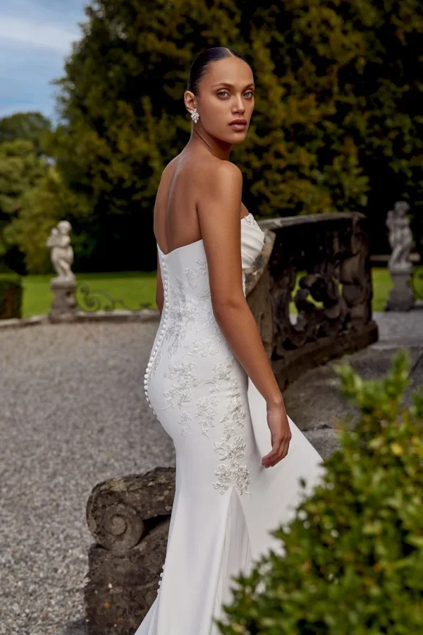 Sophisticated Fit-and-Flare Wedding Dress With Lace Appliqués by Justin Alexander - Image 2