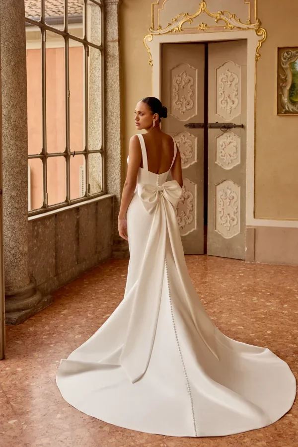 Sleek And Modern Fit-and-Flare Gown With Detachable Bow by Justin Alexander - Image 2