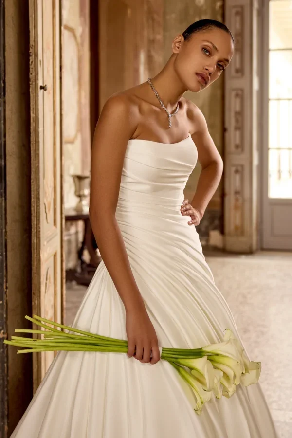 Sleek A-line Wedding Dress With Structured Draping by Justin Alexander - Image 2