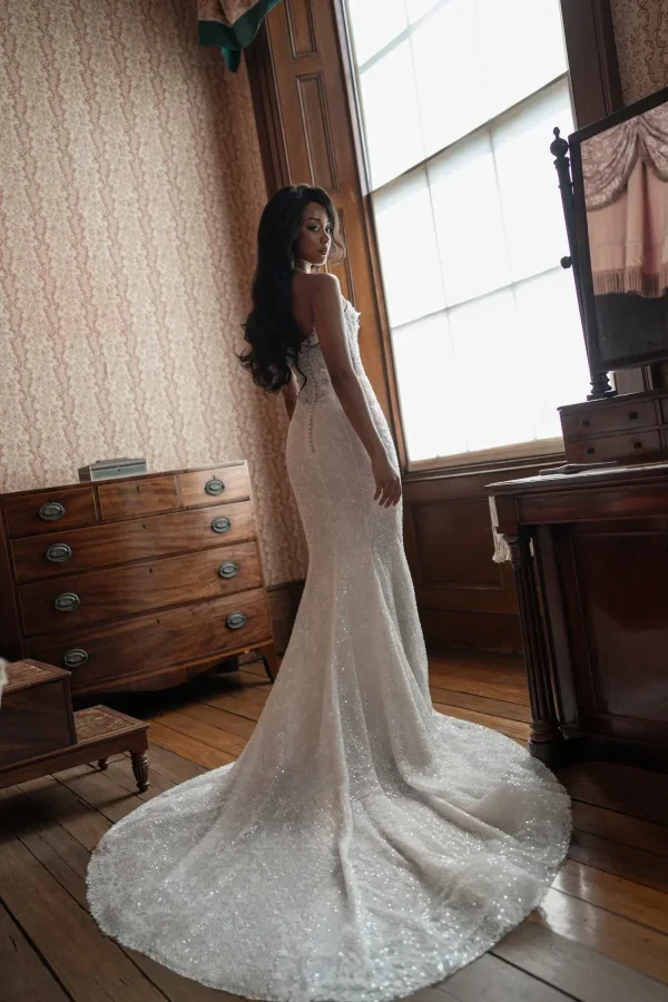 Modern Shimmering Fit‑to‑Flare Gown With Floral Appliqués by Blanche Bridal - Image 4