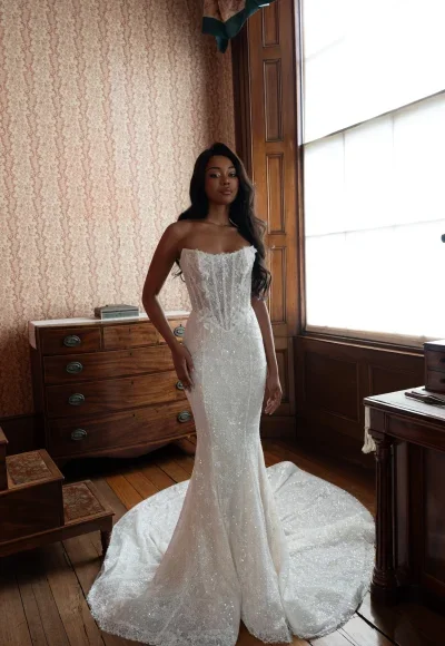 Modern Shimmering Fit‑to‑Flare Gown With Floral Appliqués by Blanche Bridal - Image 2