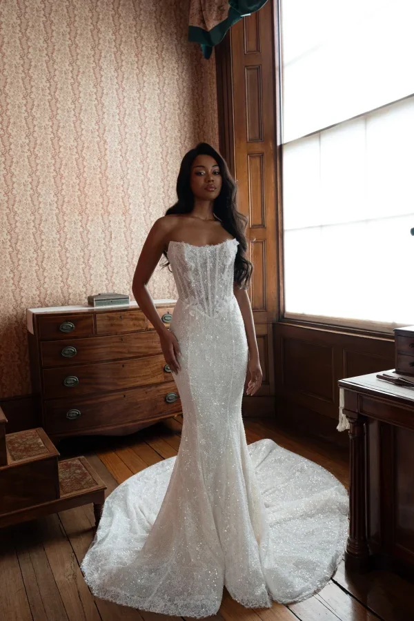 Modern Shimmering Fit‑to‑Flare Gown With Floral Appliqués by Blanche Bridal - Image 2