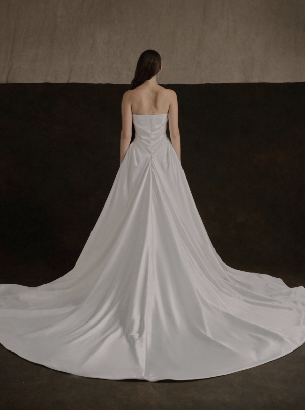Strapless Satin A‑Line Wedding Dress With Flowing Train by Enaura Bridal - Image 3