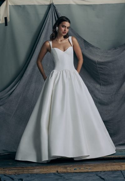 Sleek And Simple Silk Ball Gown With Straps And Buttons by Anne Barge